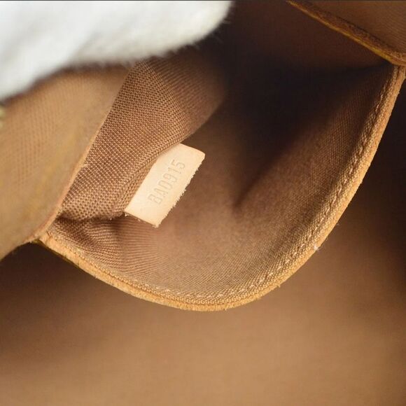 Louis Vuitton Alma Monogram Handbag - Picture 5 of 10